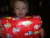 Ben with a present at Gramps\' house.