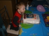 Ben blowing out his candles.