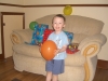 Ben with his unwrapped birthday presents.